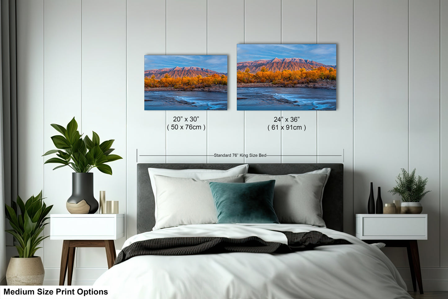 a bed room with a neatly made bed and two pictures on the wall