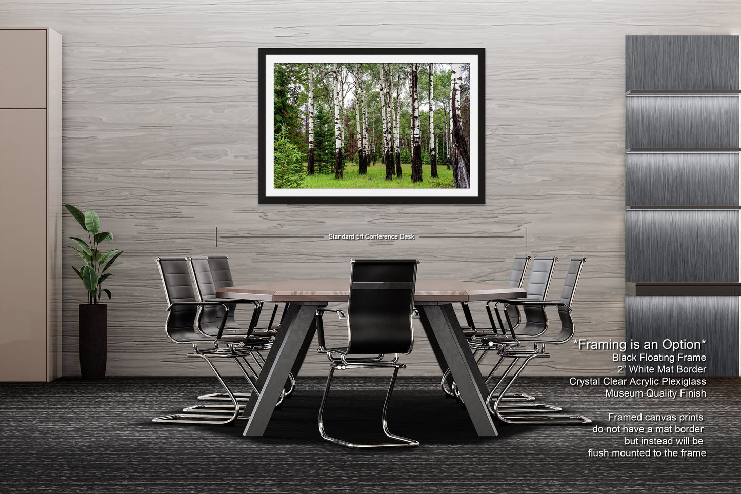 a dining room table with chairs and a picture hanging on the wall