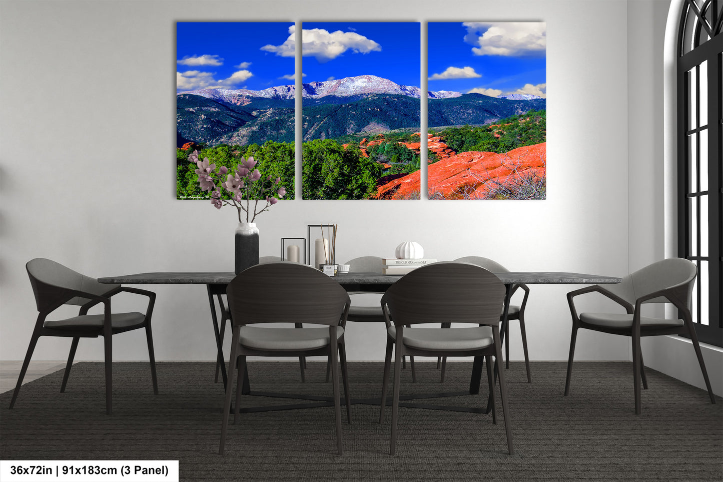 a dining room with a table and chairs