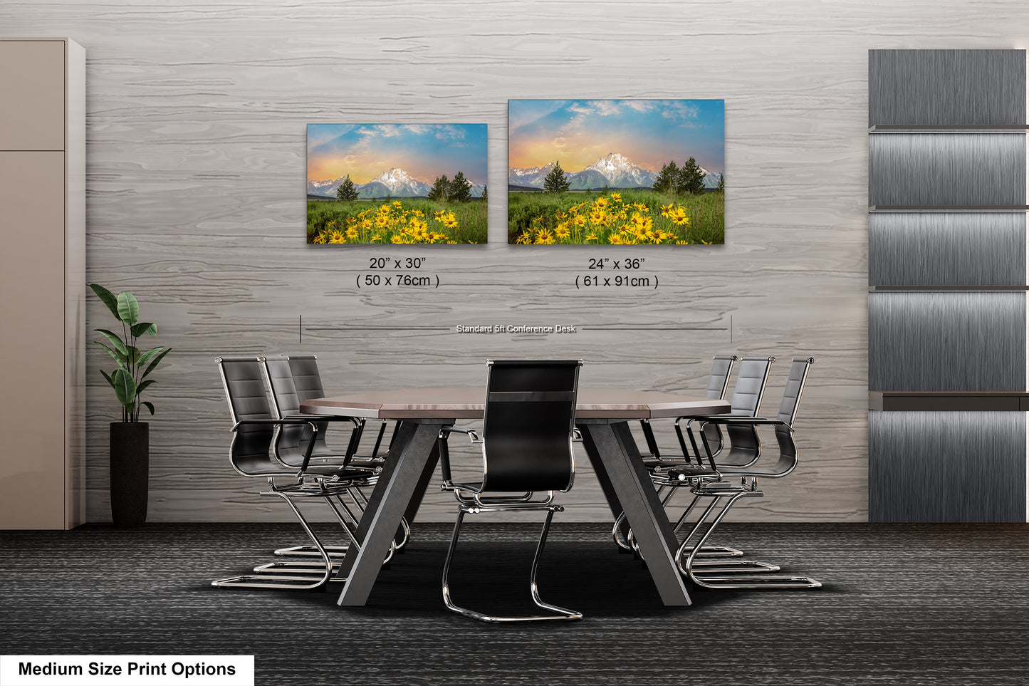 a dining room table with four chairs and two pictures on the wall