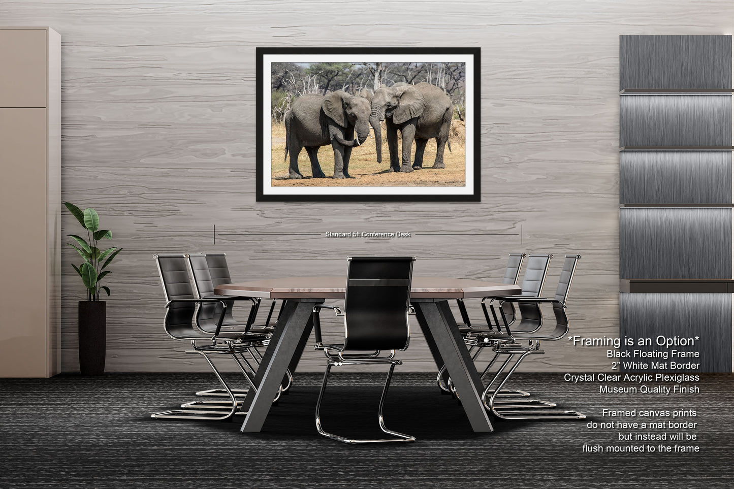 a group of elephants standing next to each other