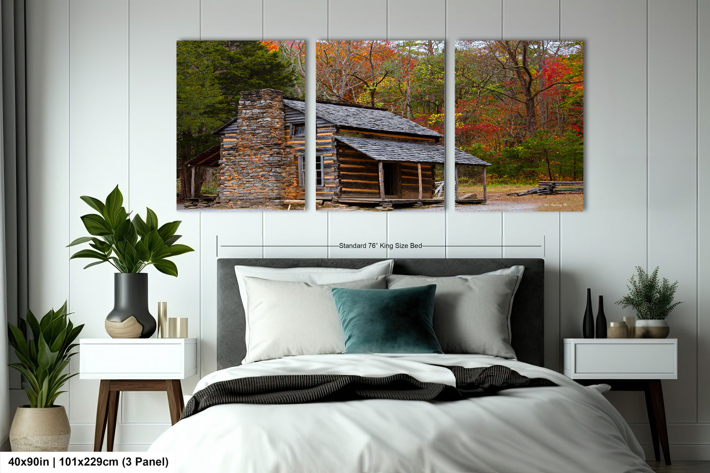 a bed room with a neatly made bed and two pictures on the wall