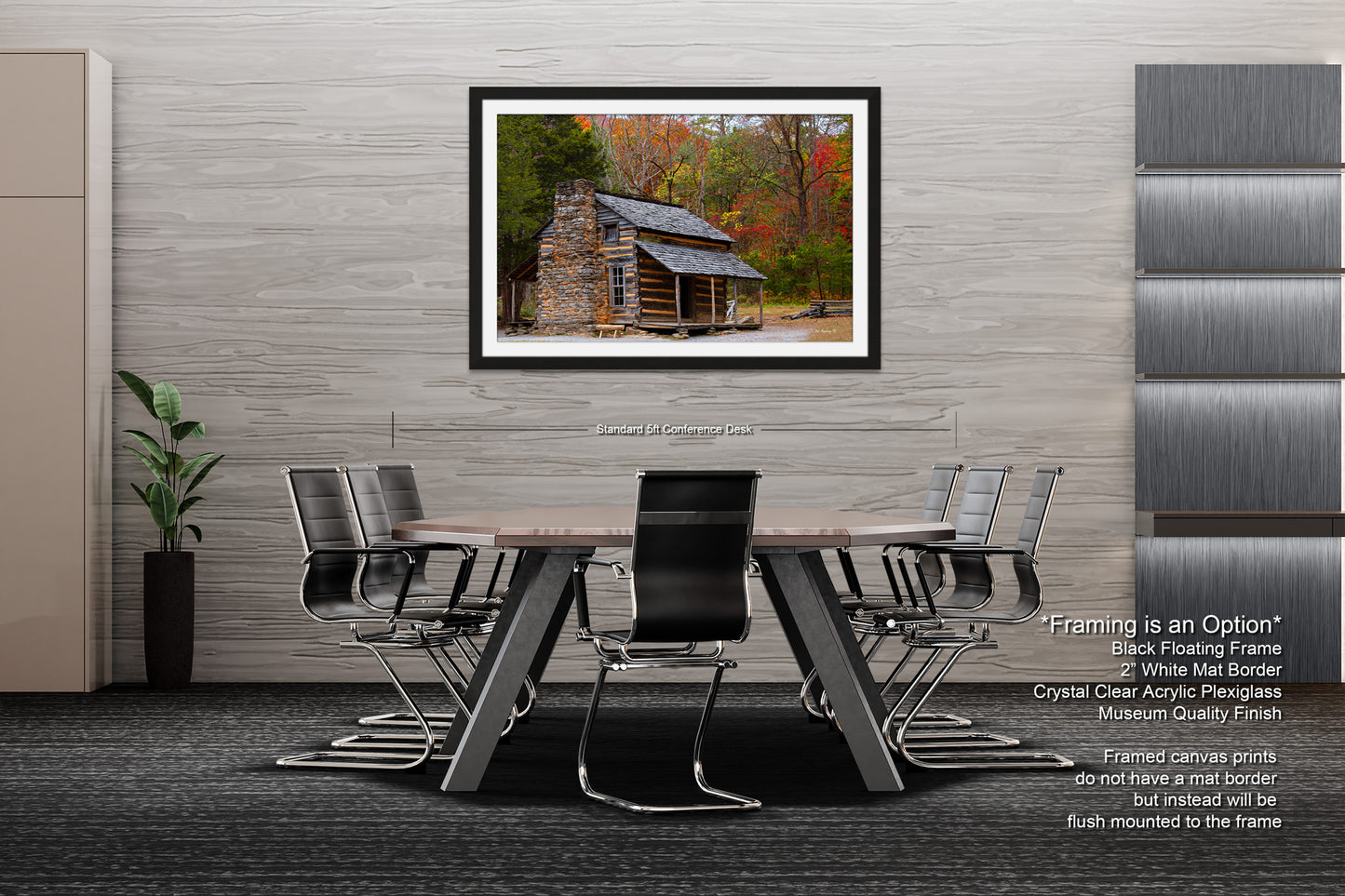 a dining room table with chairs and a picture of a log cabin