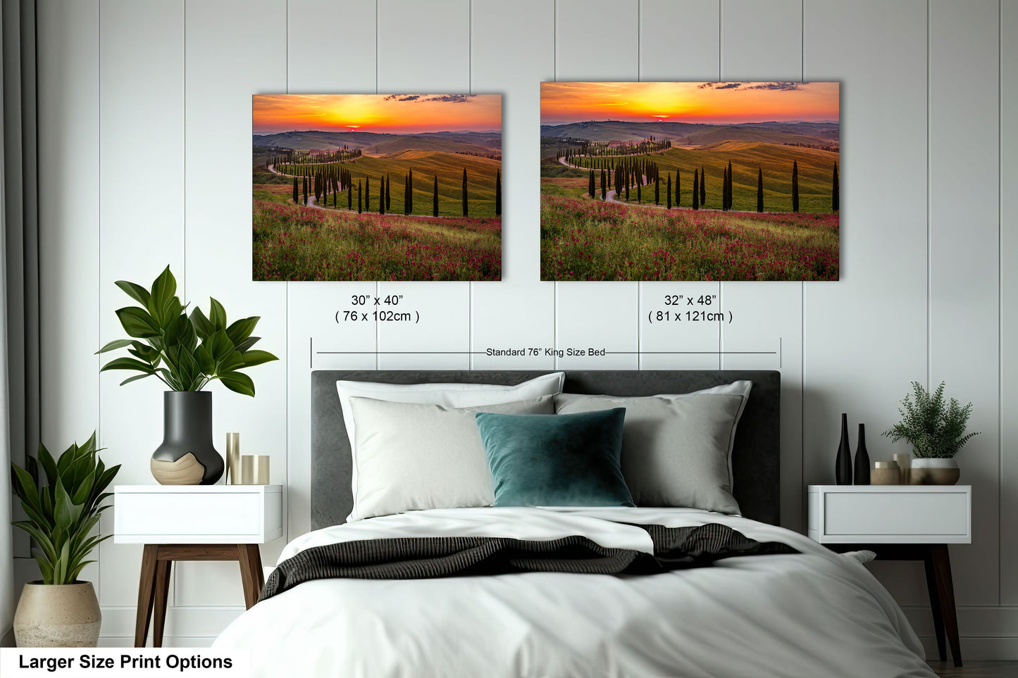 a bedroom with a bed and two pictures on the wall