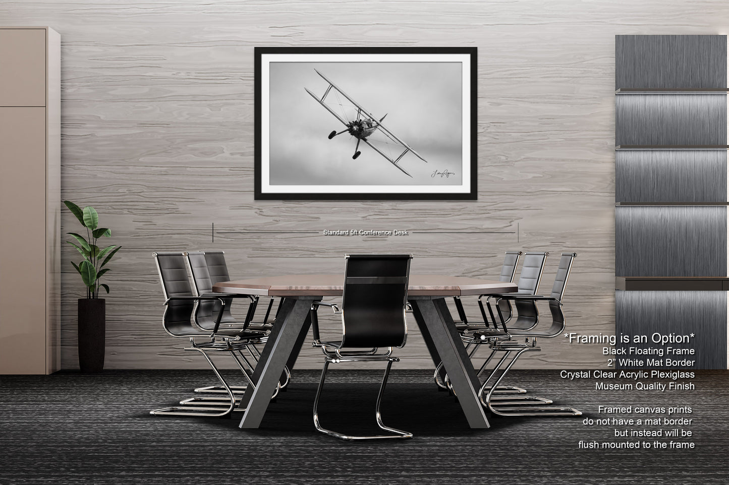 a black and white photo of a table and chairs