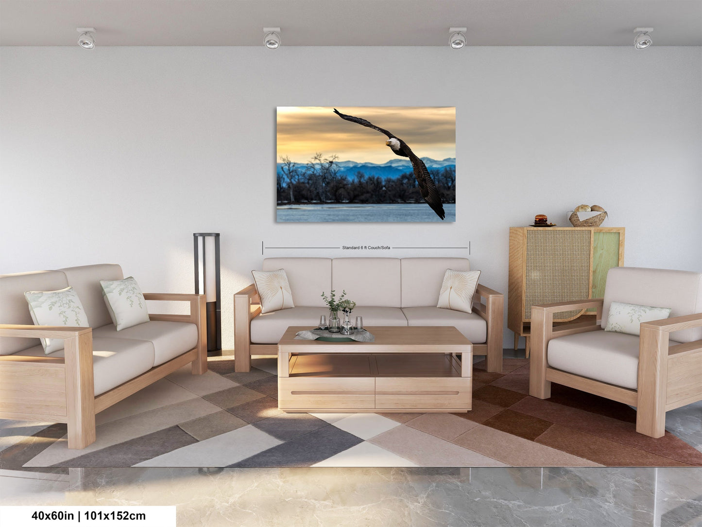 a living room filled with furniture and a painting on the wall