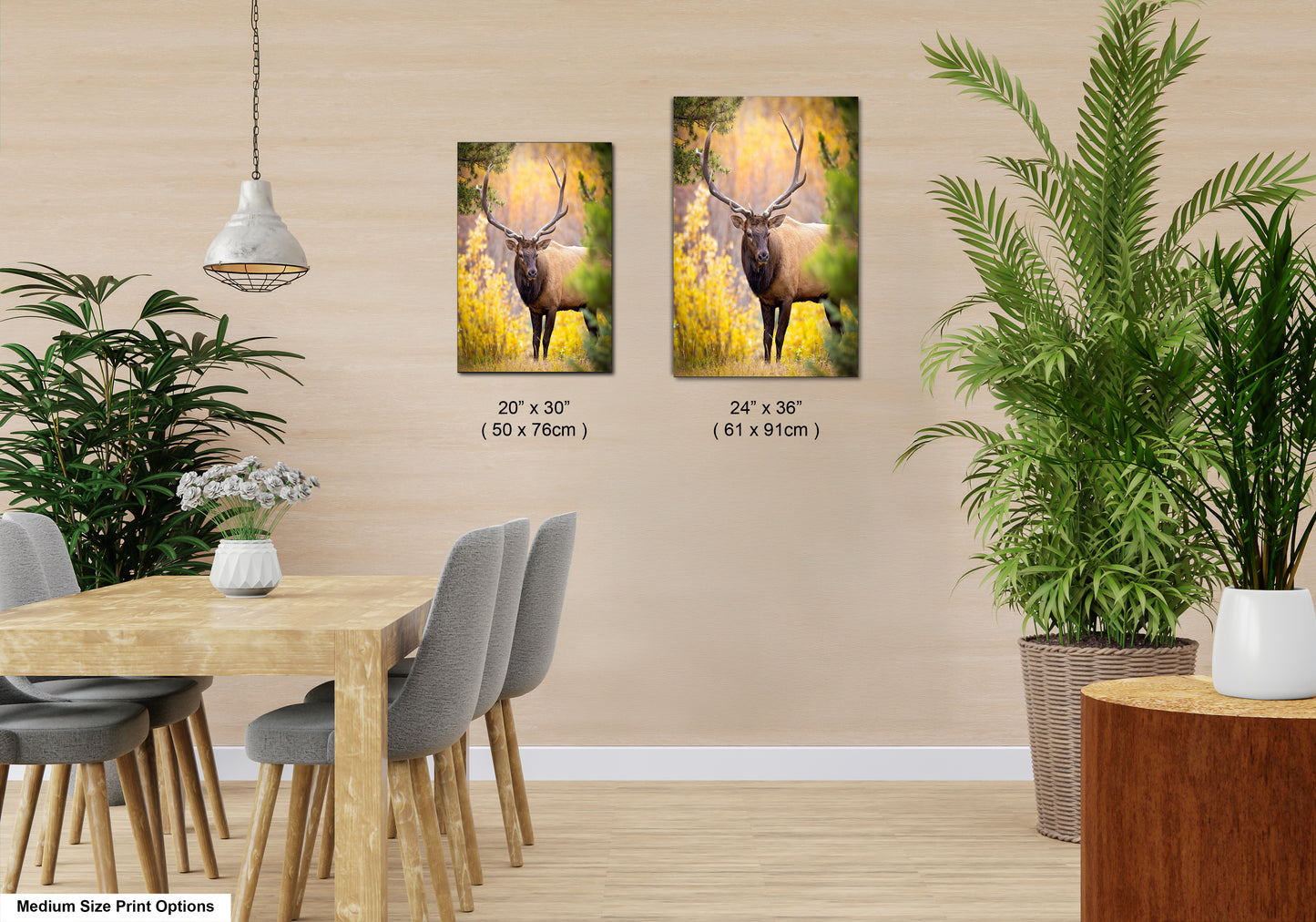 a dining room table with chairs and a painting of a deer