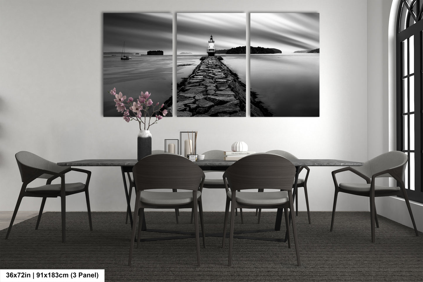 a black and white photo of a table and chairs