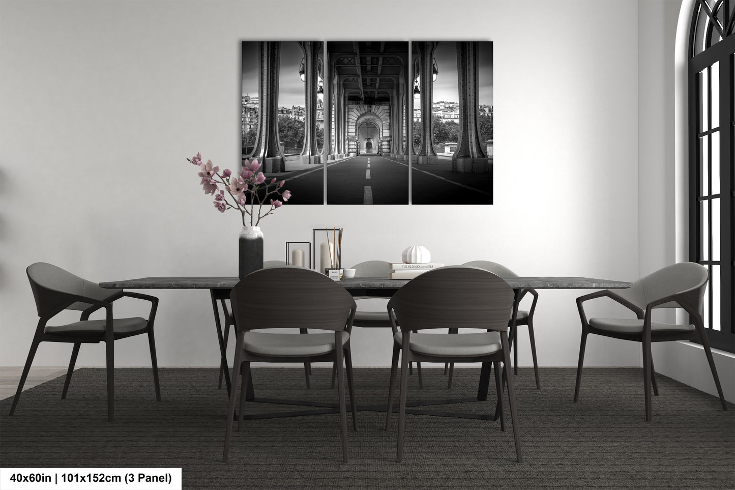 a black and white photo of a dining room