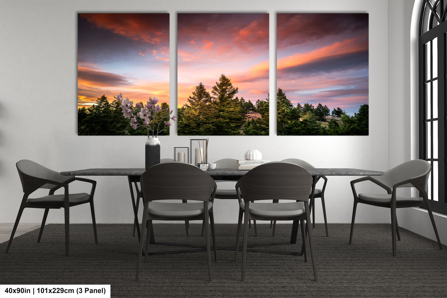 a dining room with a table and four chairs