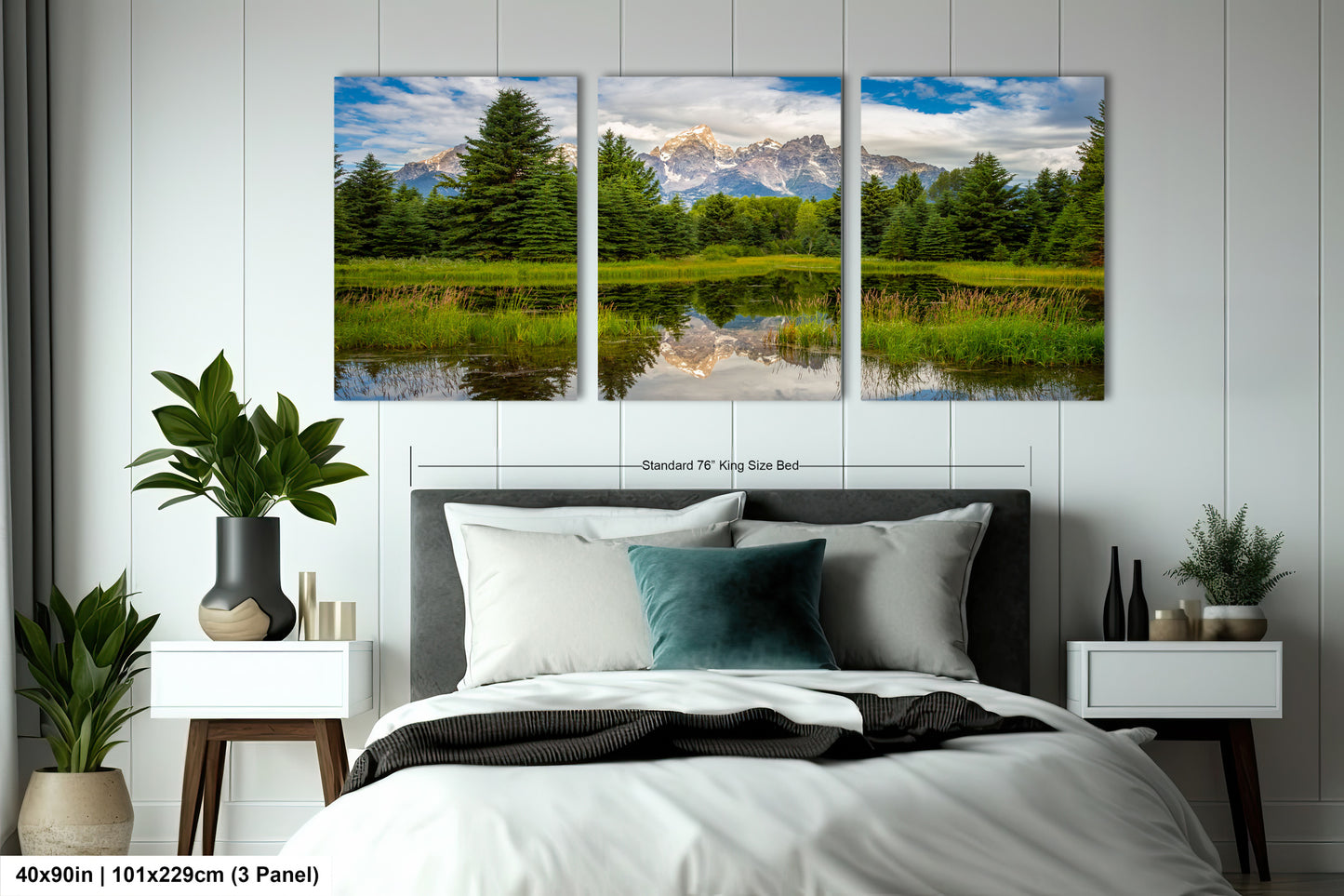 a bed room with a neatly made bed and two paintings on the wall