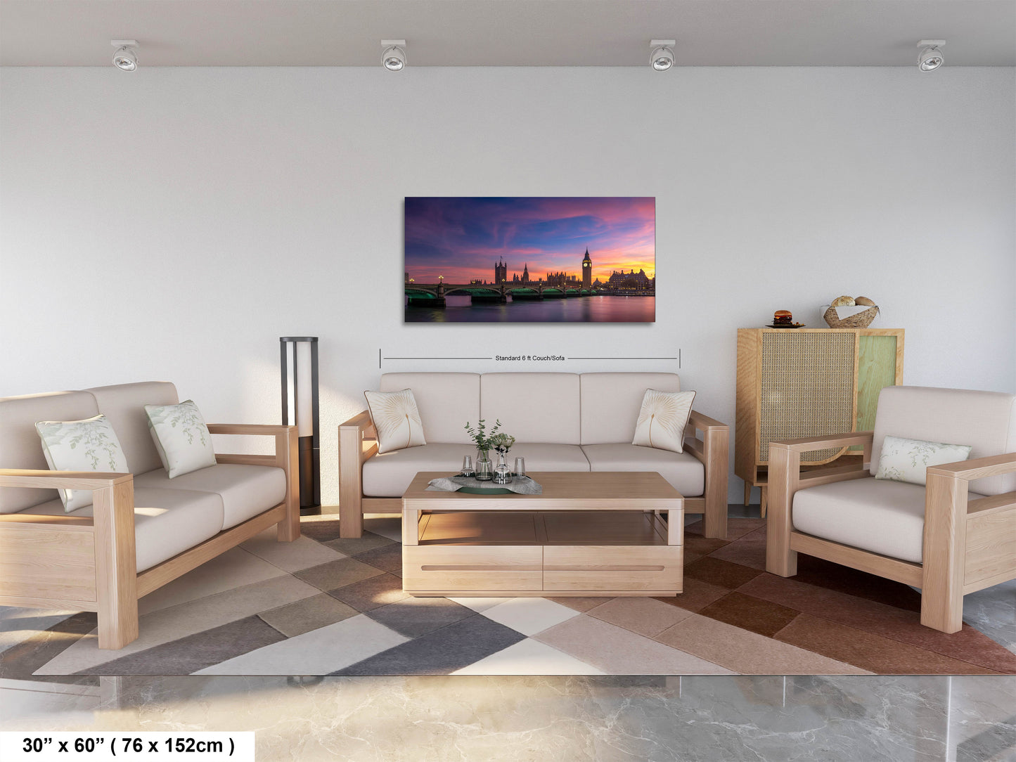 a living room filled with furniture and a painting on the wall