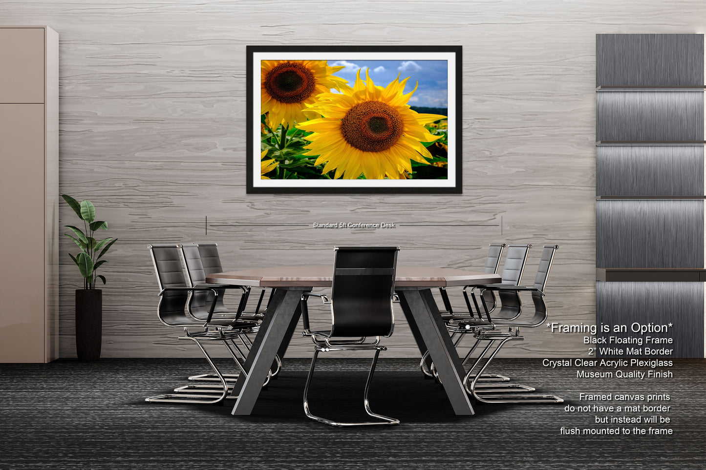 a picture of a table with chairs and a vase of sunflowers