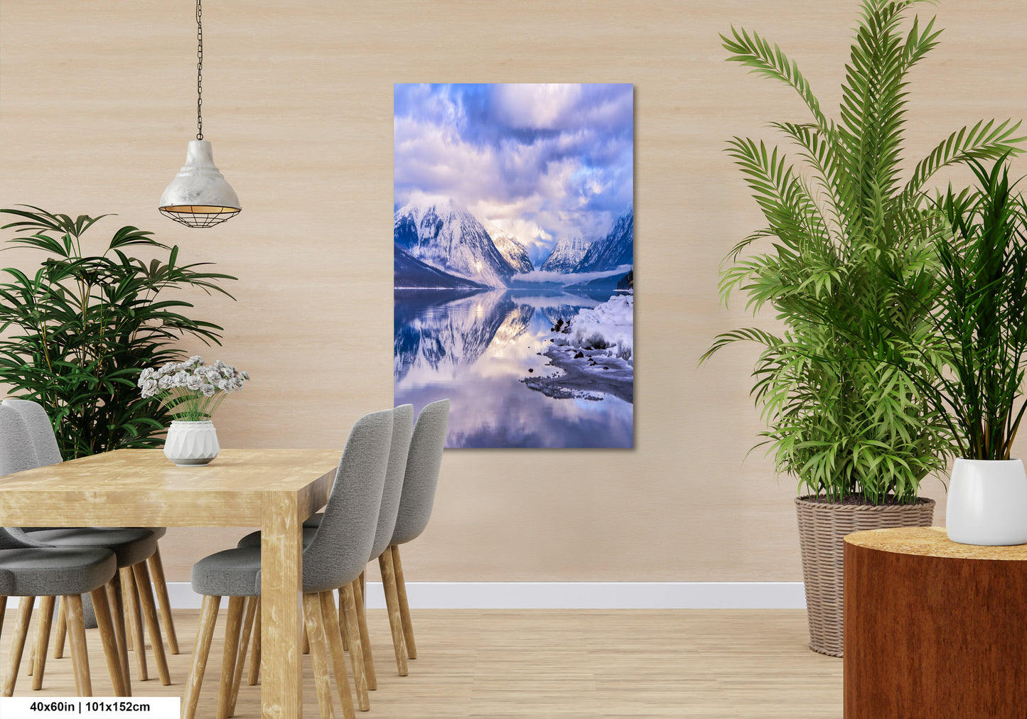 a room with a table and chairs and a painting on the wall