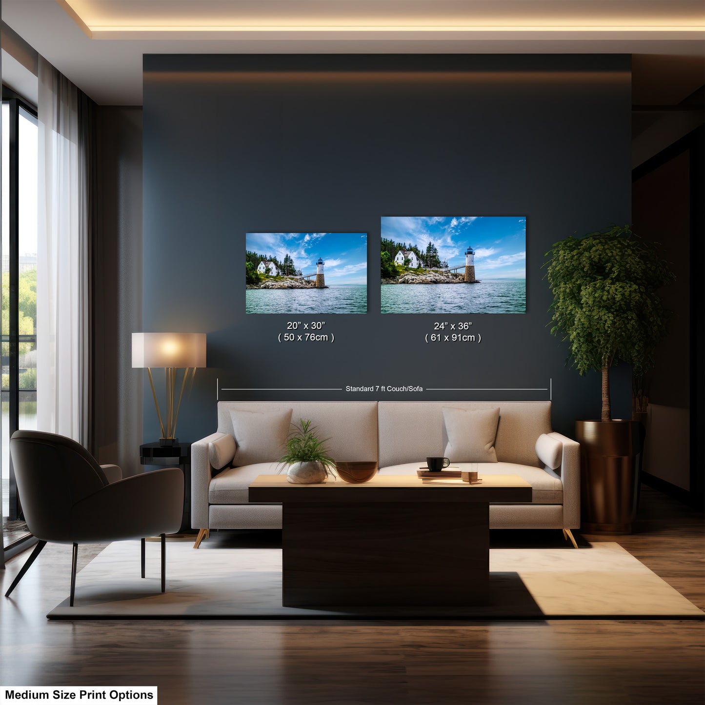 a living room with a couch and two pictures on the wall