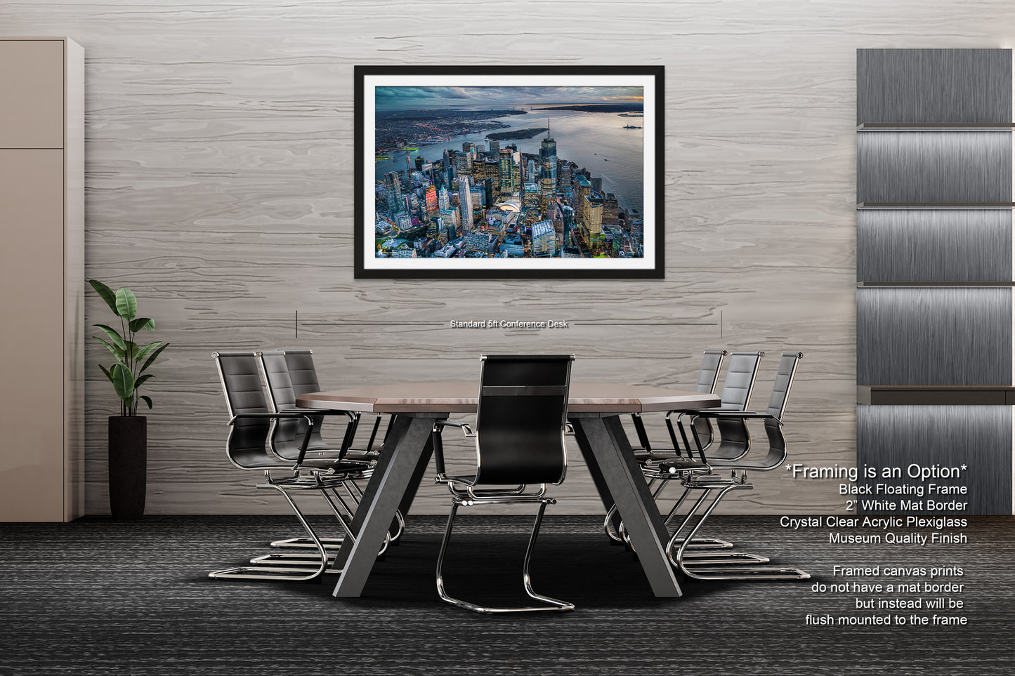 a dining room table with chairs and a picture hanging on the wall