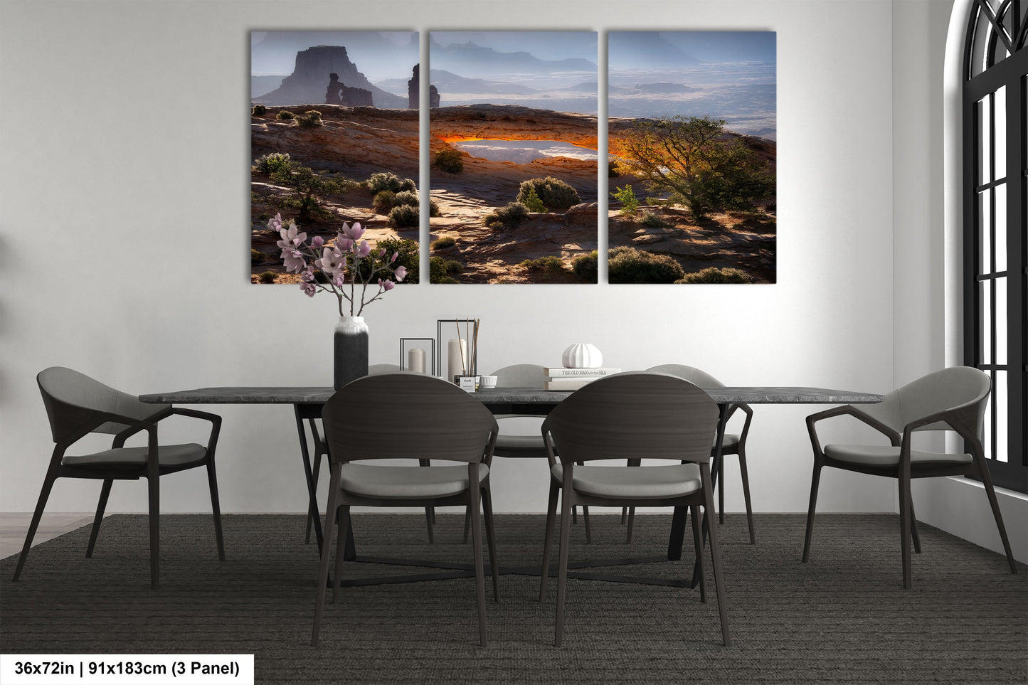 a dining room with a table and four chairs