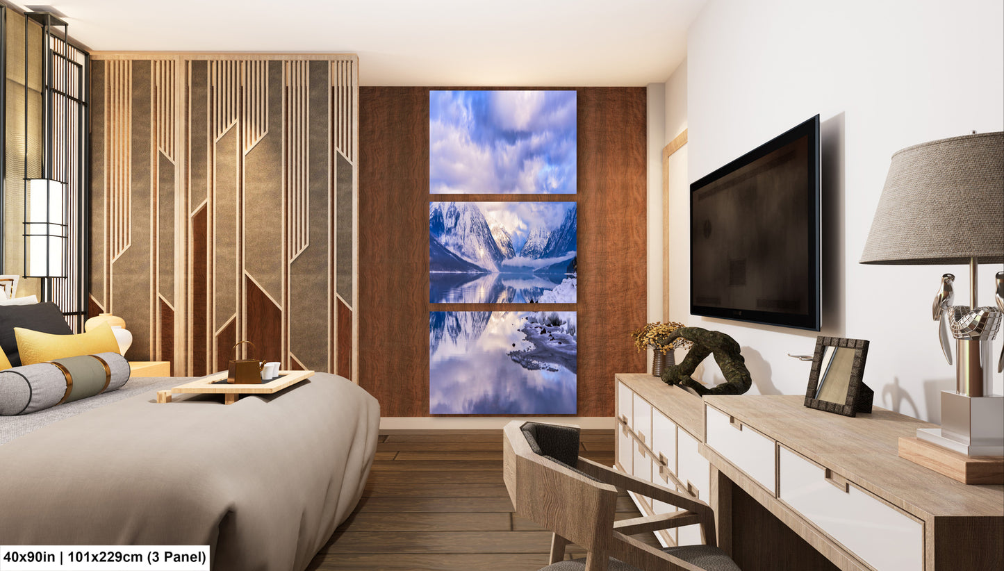 a bedroom with a large bed and a flat screen tv
