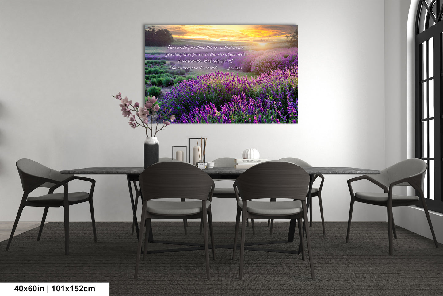 a dining room table with chairs and a vase of flowers