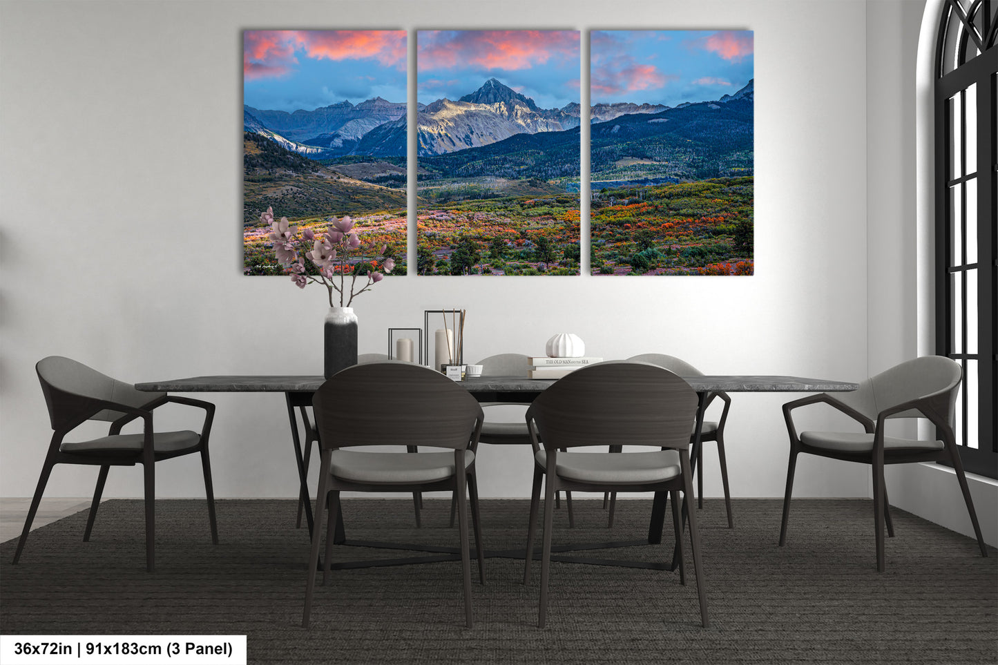 a dining room with a table and chairs