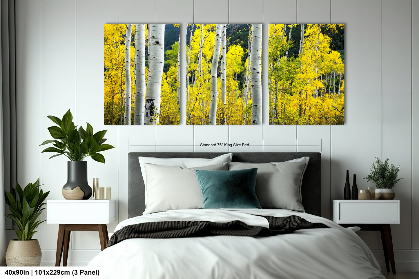 a bed room with a neatly made bed and a painting on the wall