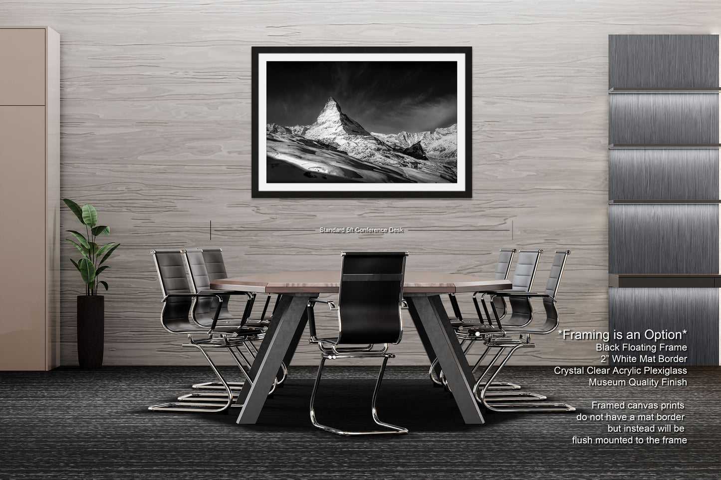 a black and white photo of a dining room table