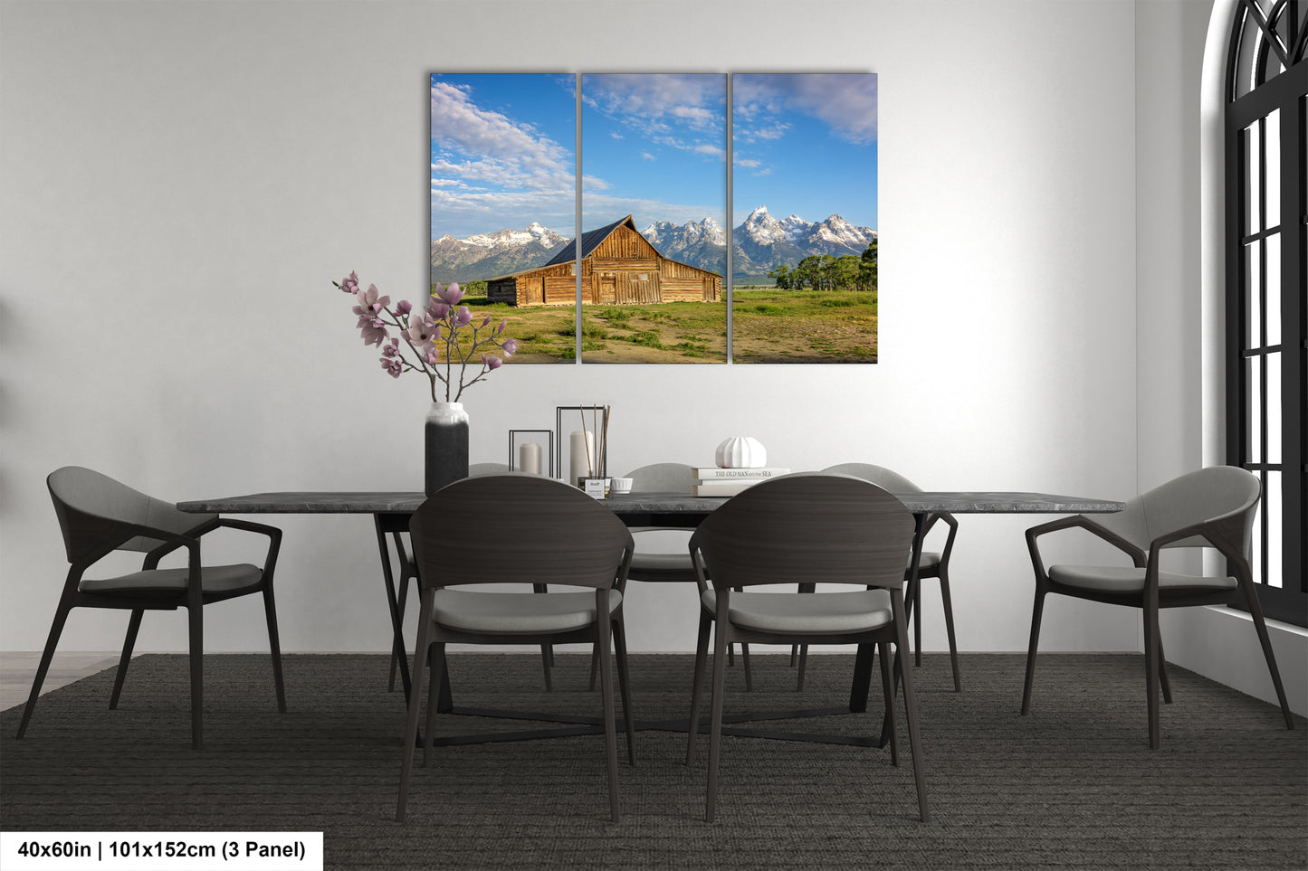a dining room with a table and chairs