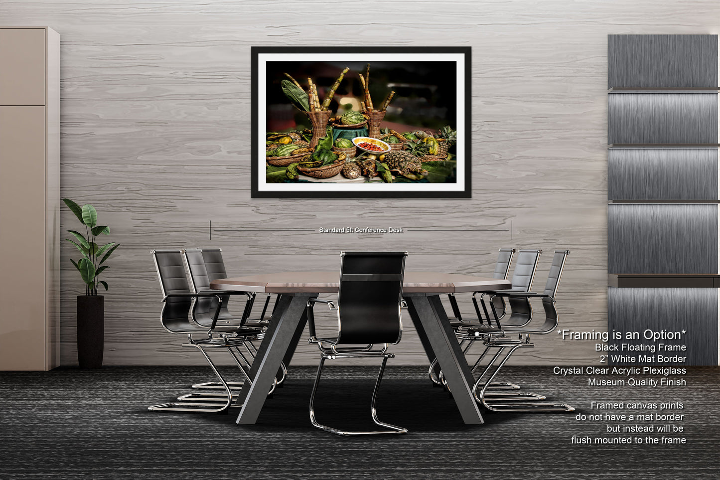 a table with chairs and a picture hanging on the wall