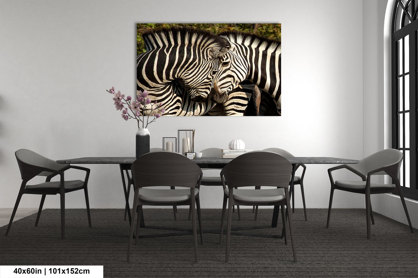 a couple of zebra standing next to each other