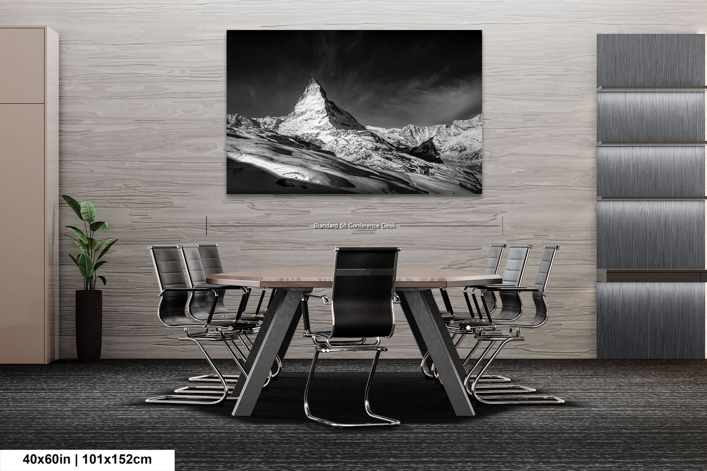 a black and white photo of a table and chairs