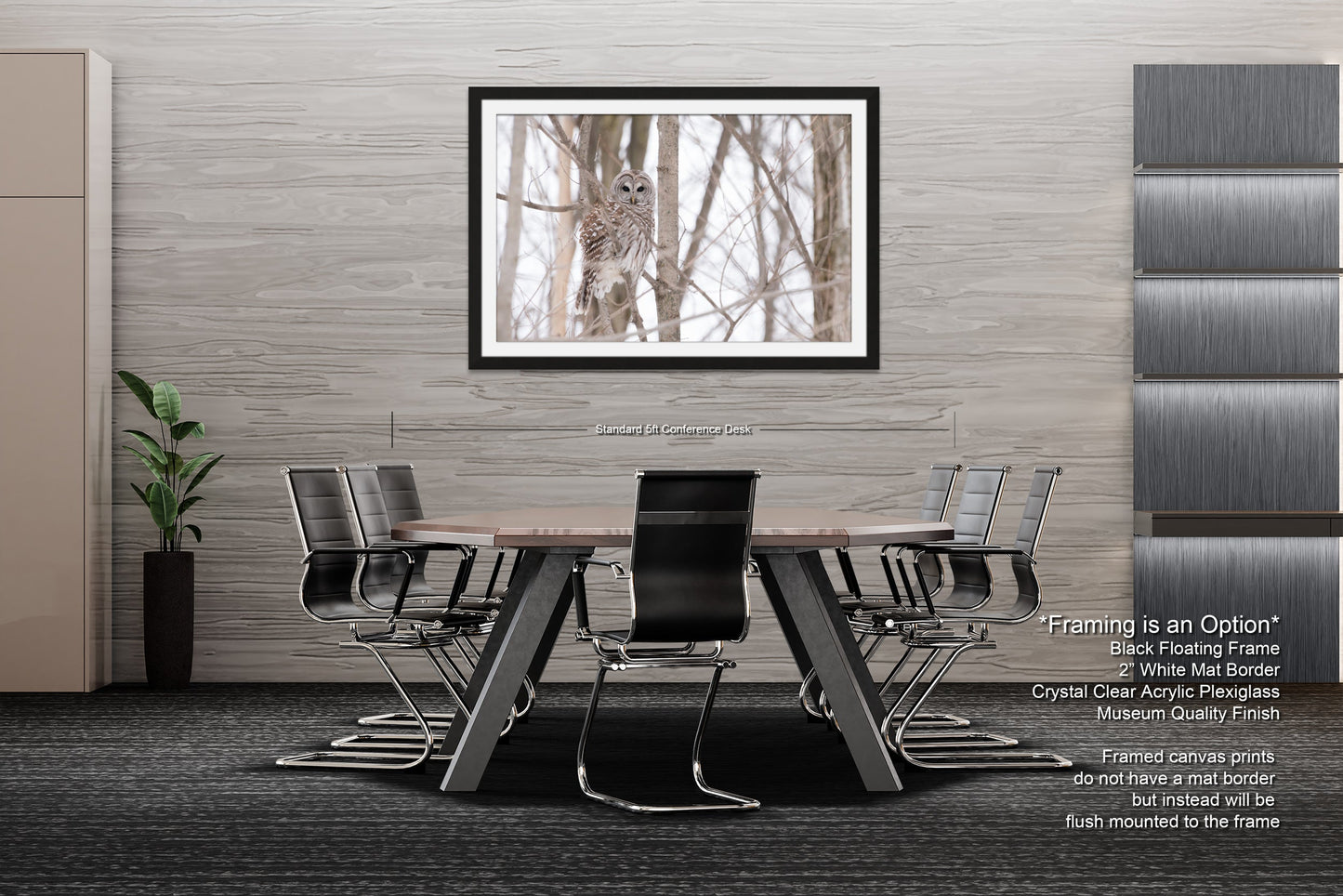 a dining room table with chairs and a picture hanging on the wall