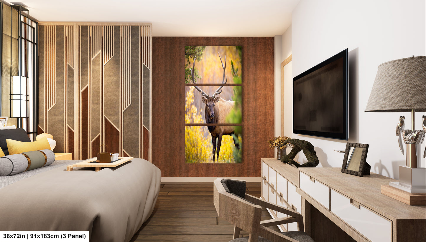a bed room with a neatly made bed and a painting on the wall