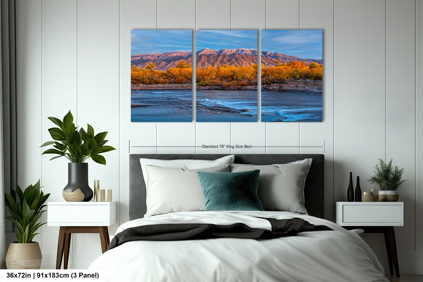 a bed room with a neatly made bed and three paintings on the wall