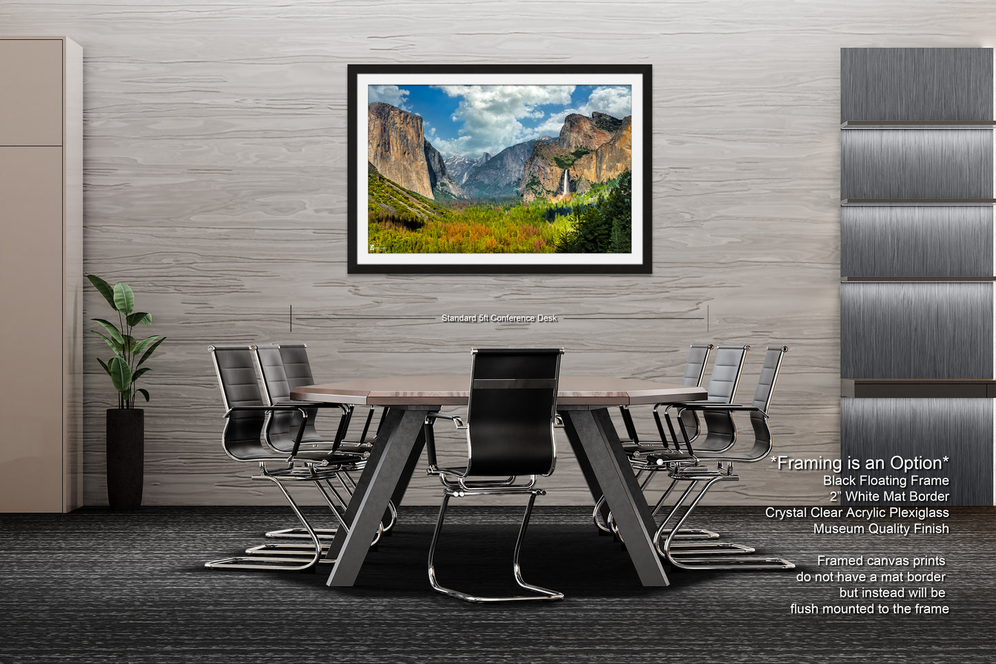 a dining room table with chairs and a picture hanging on the wall