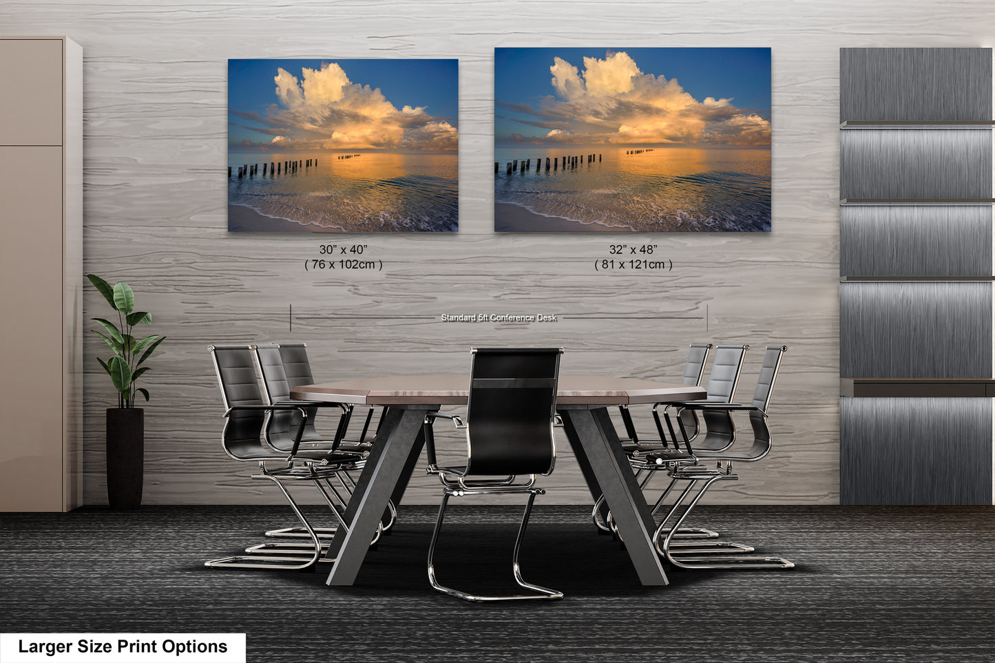 a dining room table with chairs and two pictures on the wall