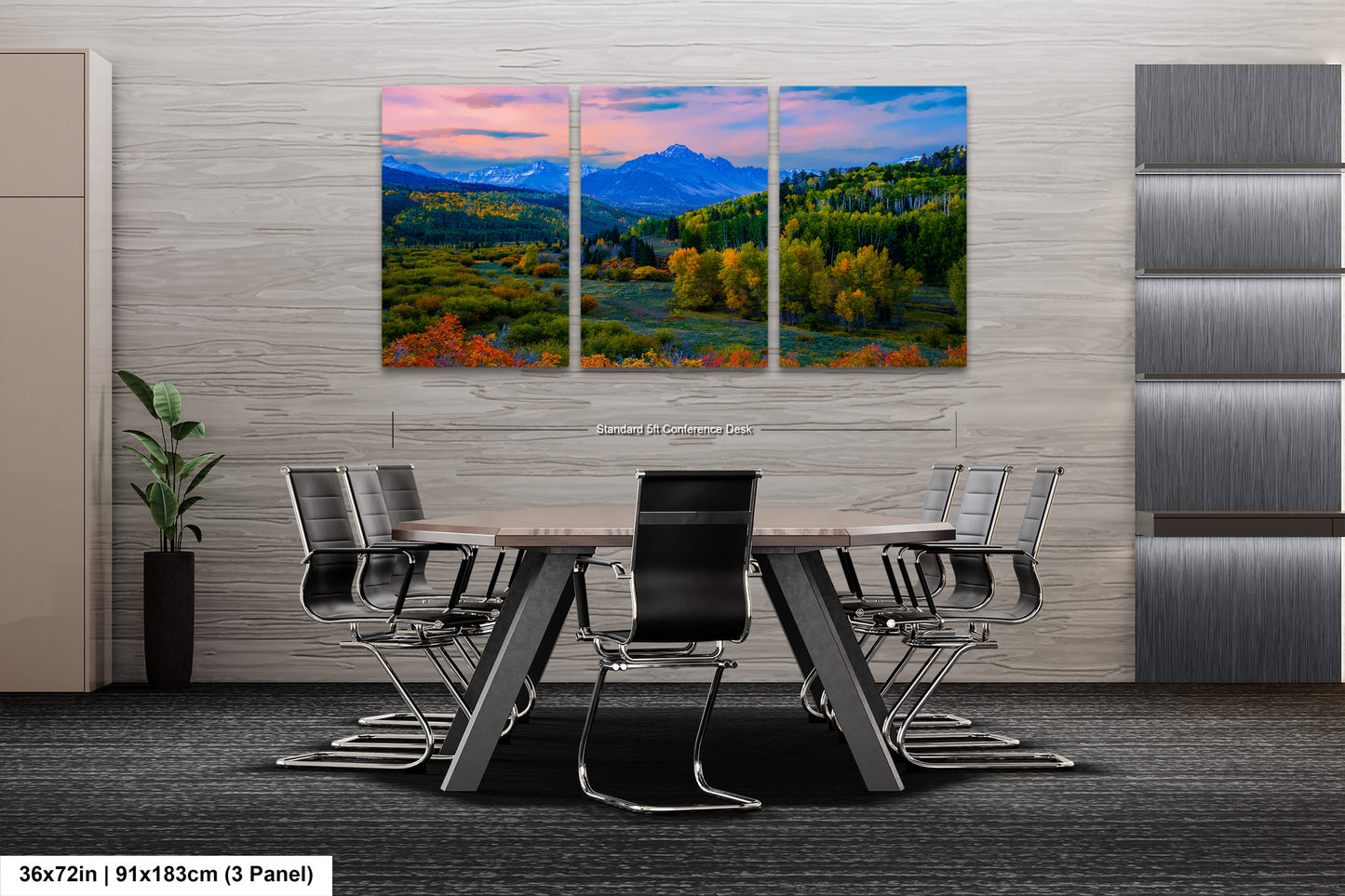 a dining room table with chairs and a painting on the wall