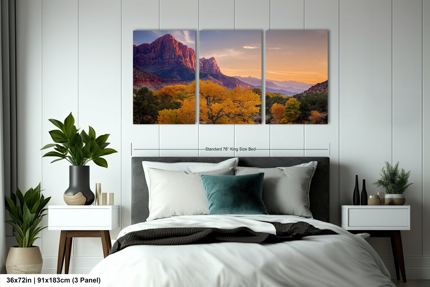 a bedroom with a bed and two paintings on the wall