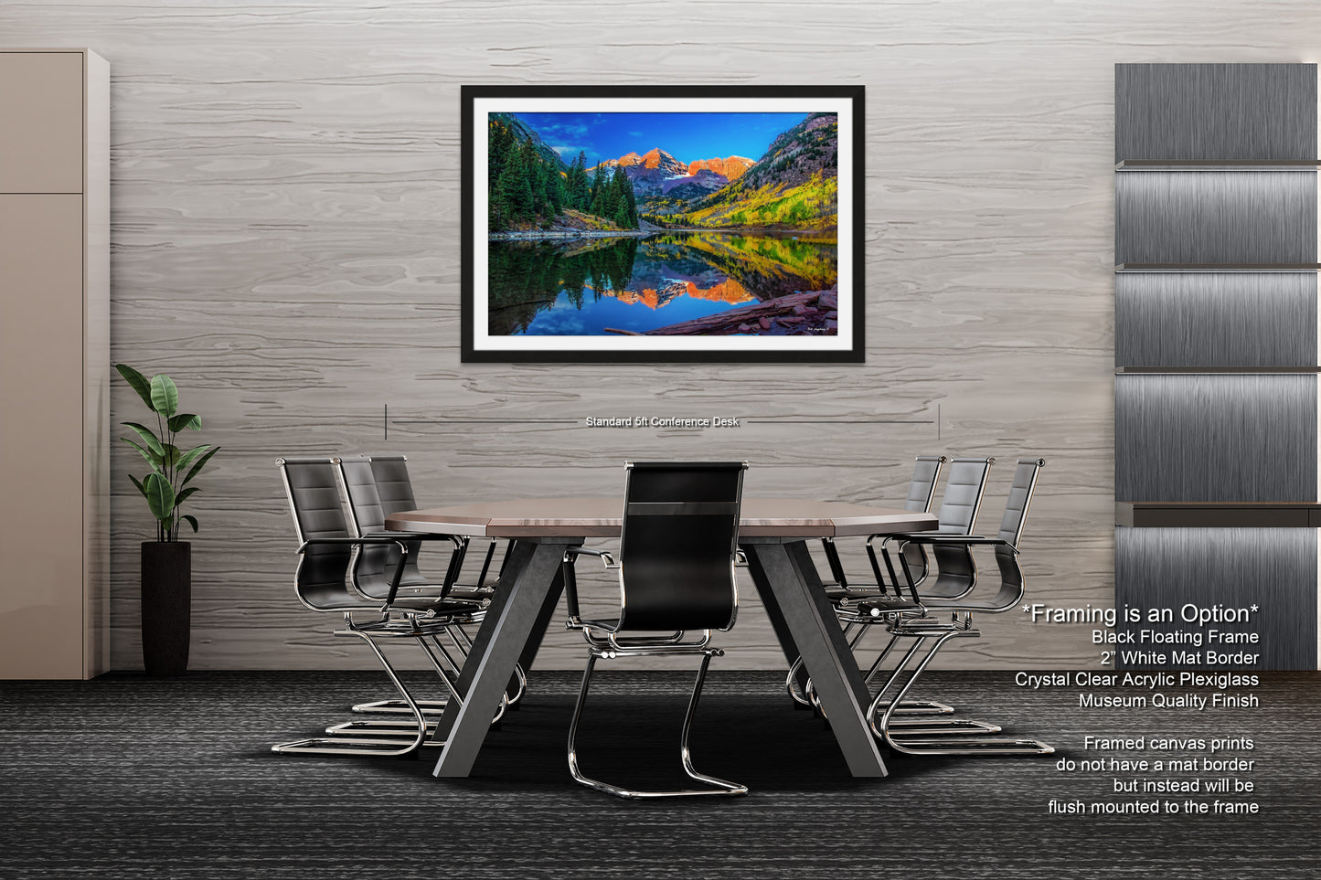 a dining room table with chairs and a painting on the wall