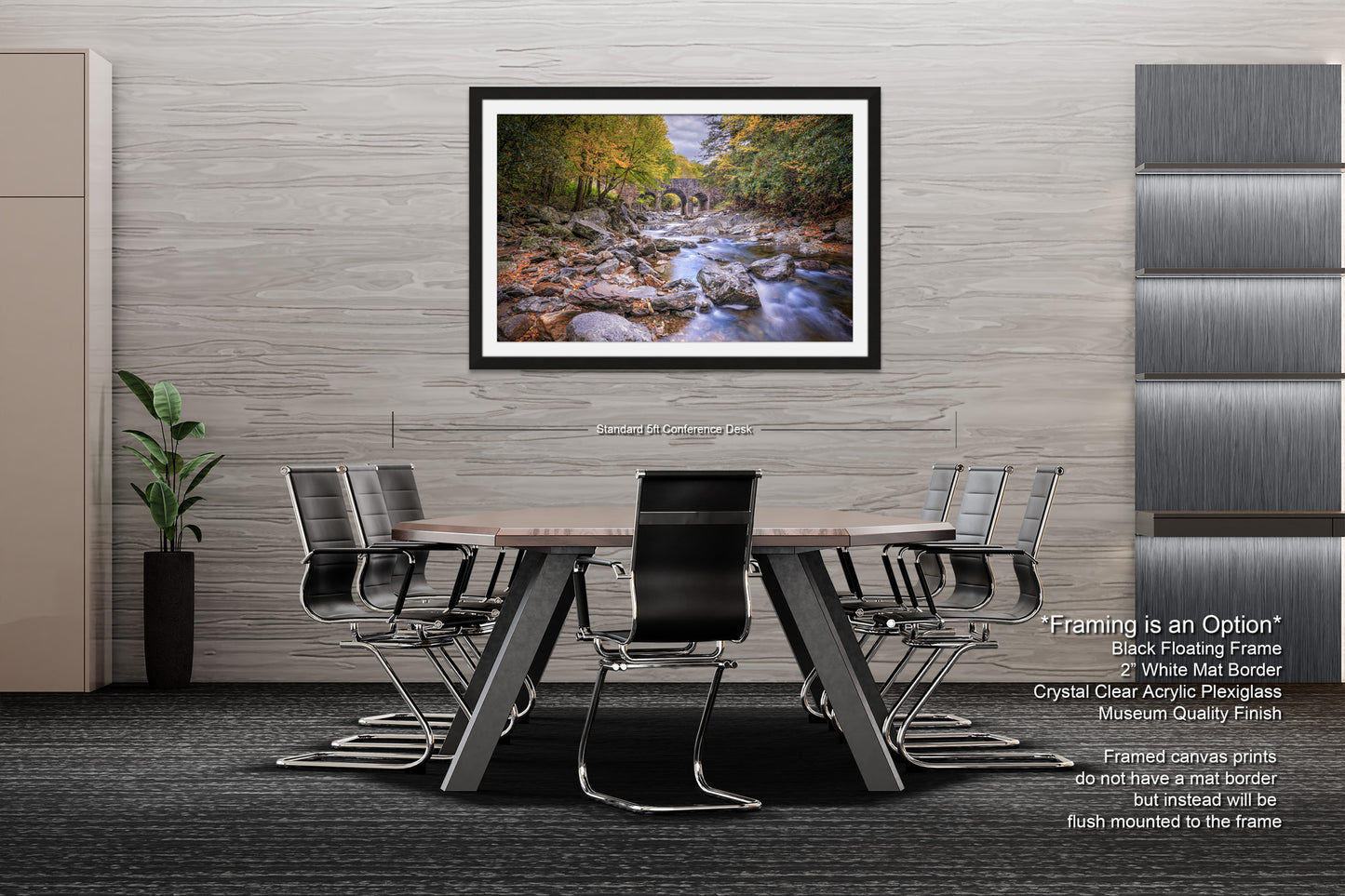 a dining room table with chairs and a picture hanging on the wall