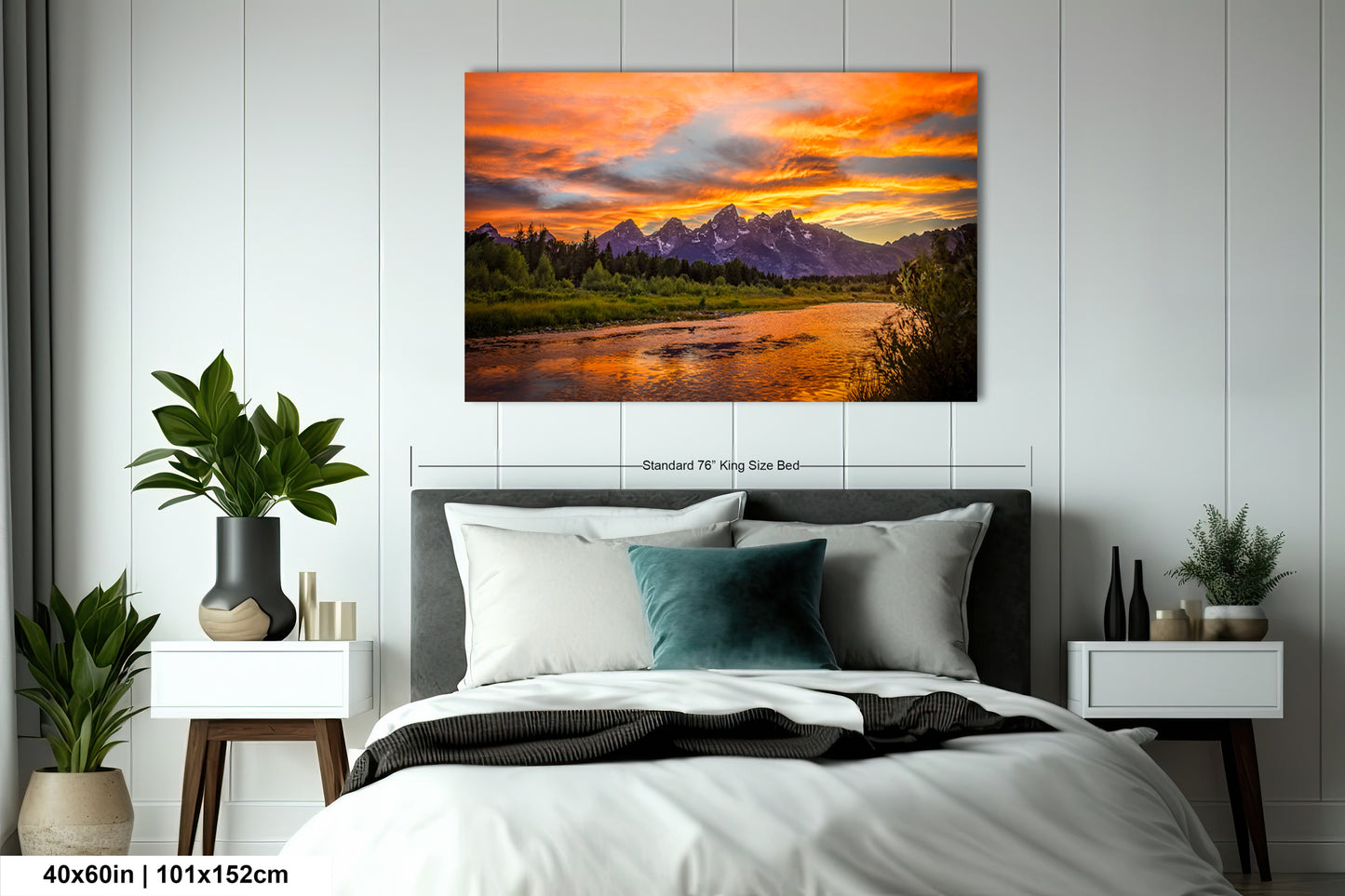 a bedroom with a bed and a painting on the wall