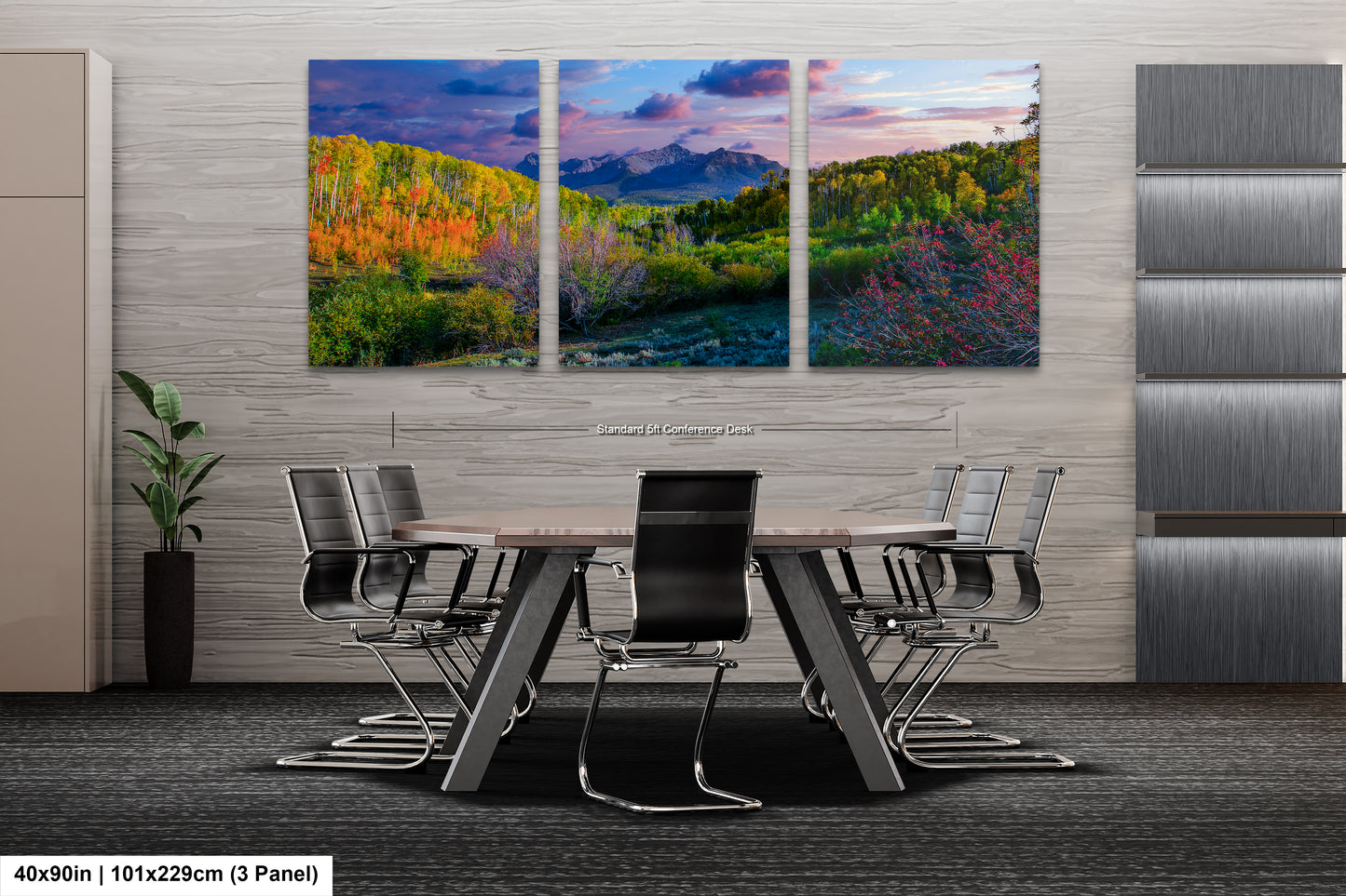 a dining room table with chairs and a painting on the wall