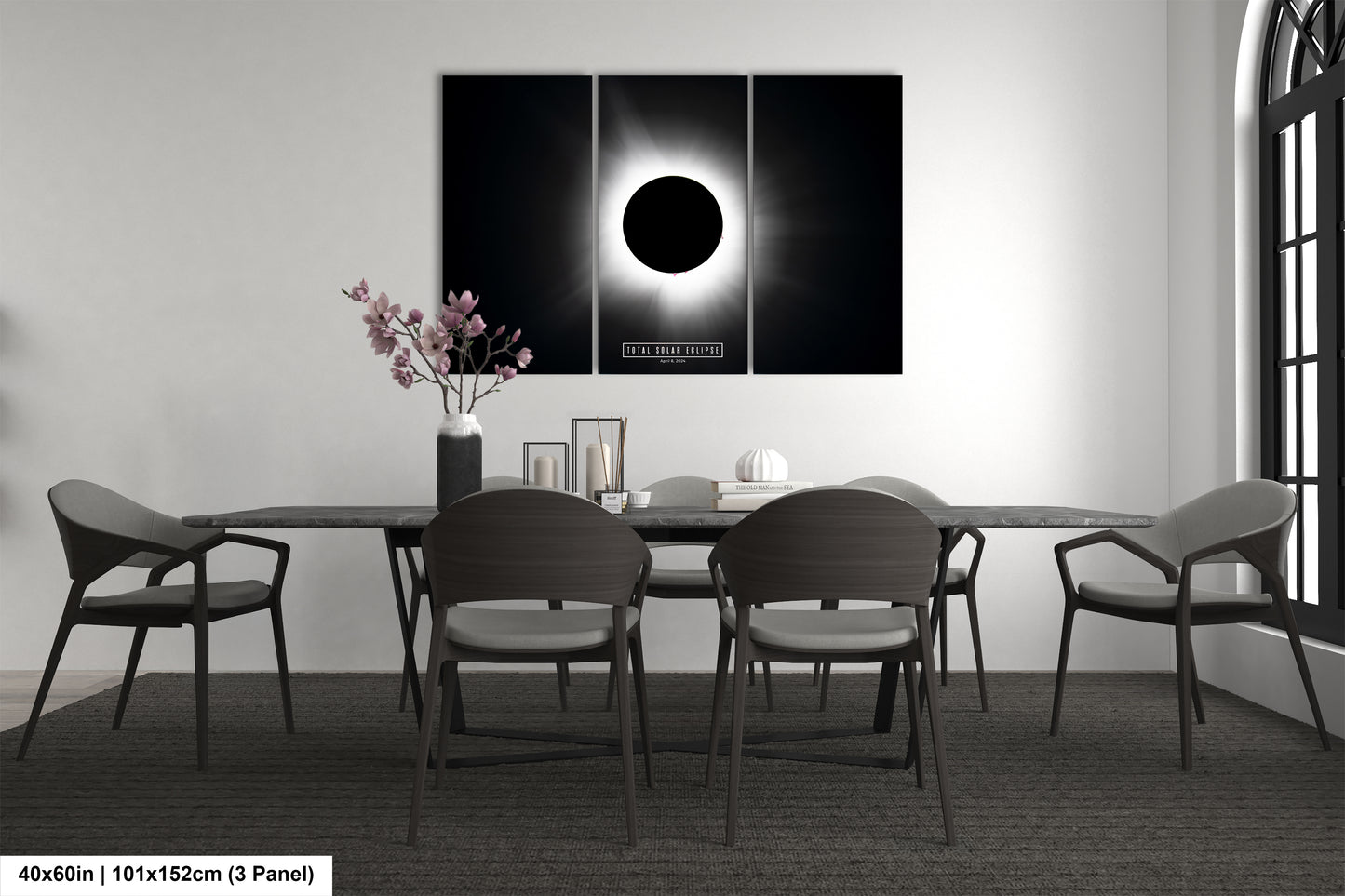 a black and white photo of a dining room