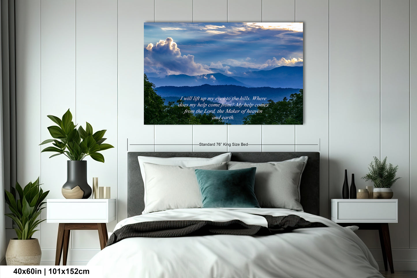a bedroom with a large bed and a painting on the wall