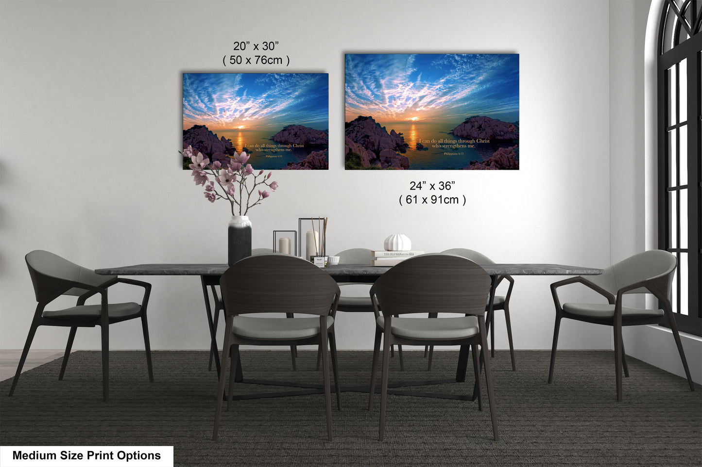 a dining table with four chairs and a vase of flowers