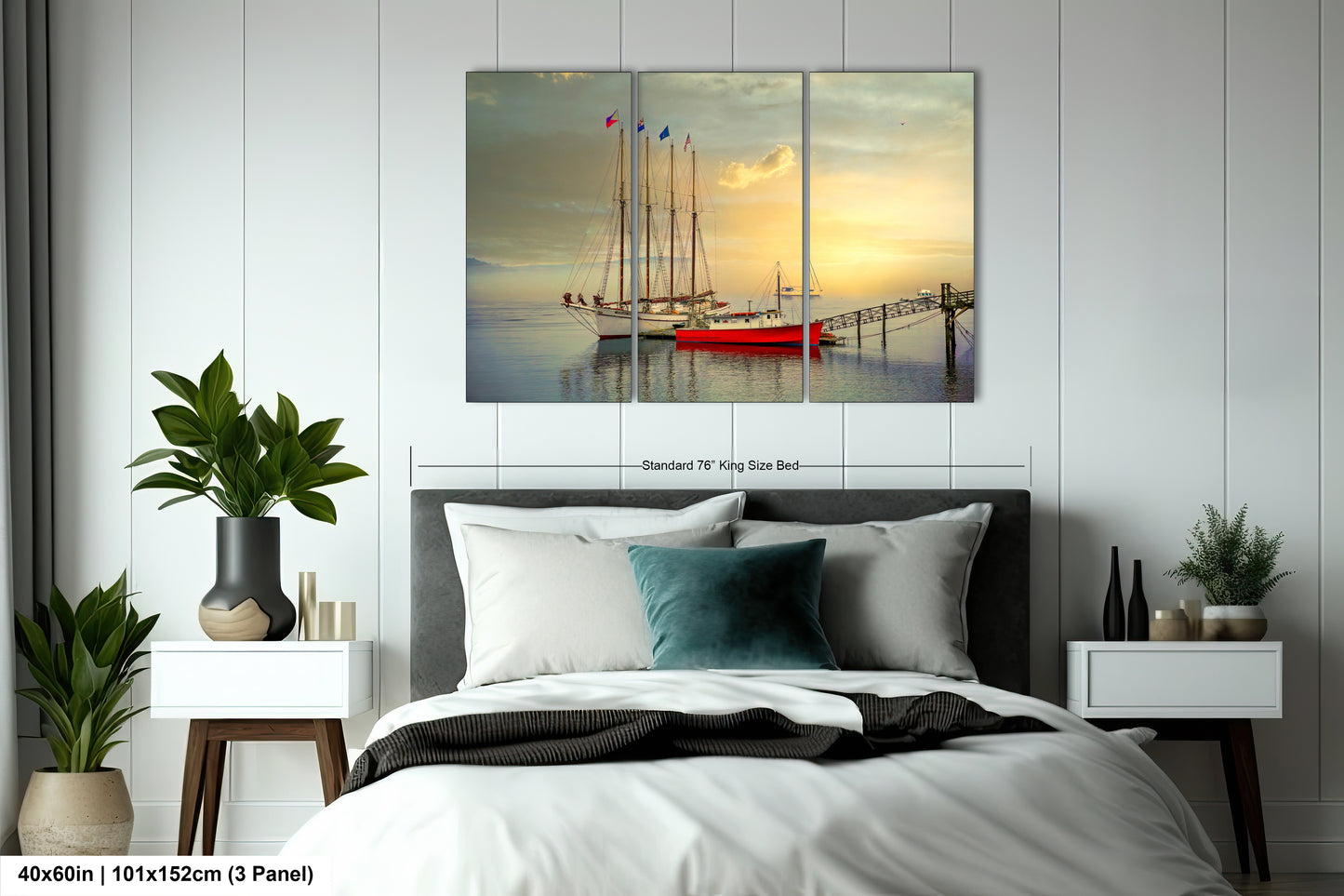 a bedroom with a bed and a painting on the wall