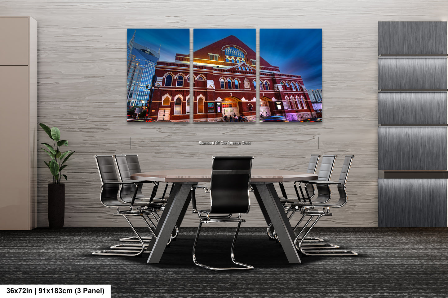 a room with a table and chairs and a picture of a building on the wall