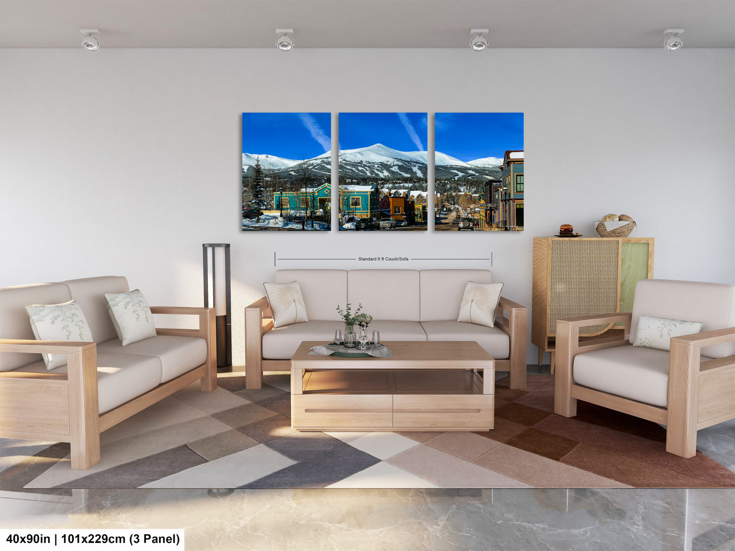 a living room filled with furniture and a painting on the wall