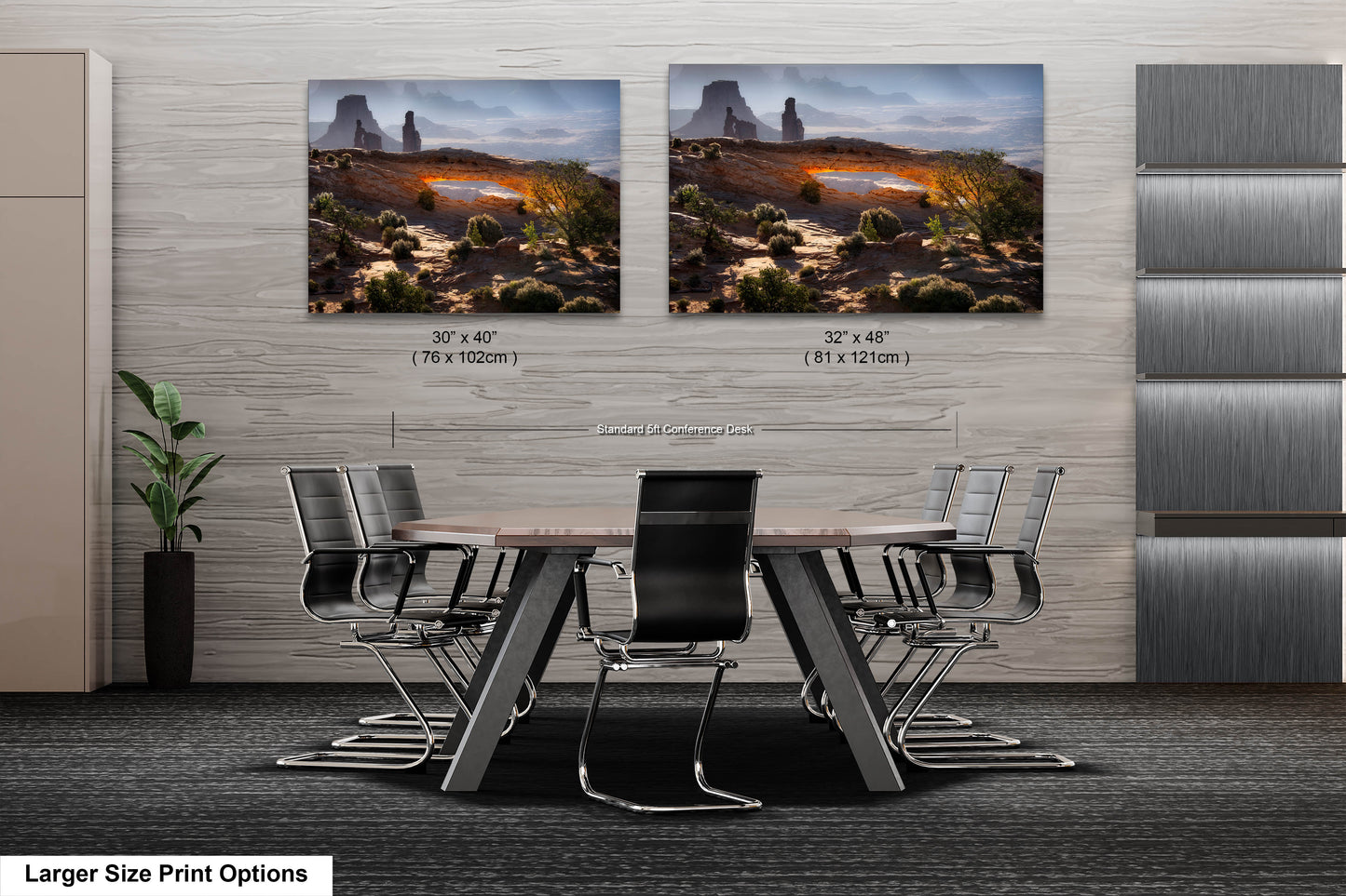 a dining room table with chairs and two pictures on the wall