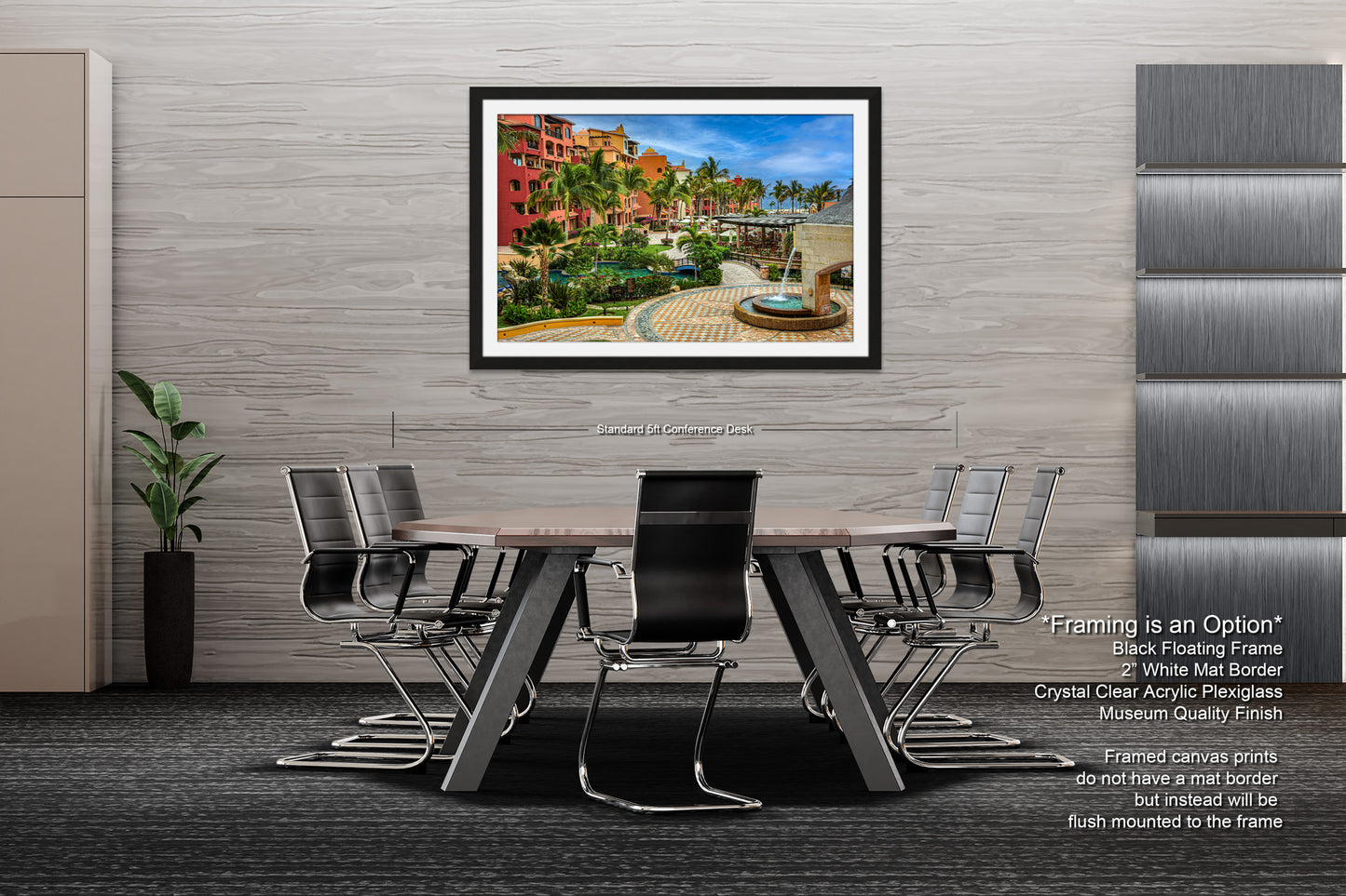 a dining room table with chairs and a painting on the wall