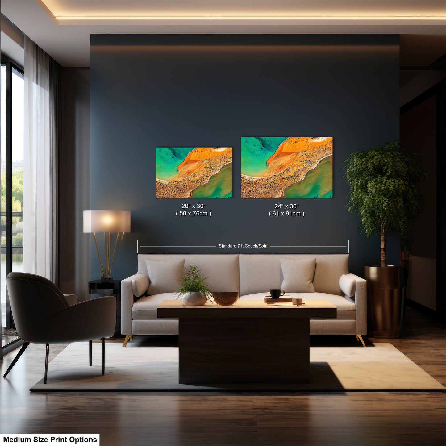 a living room with a couch and two paintings on the wall